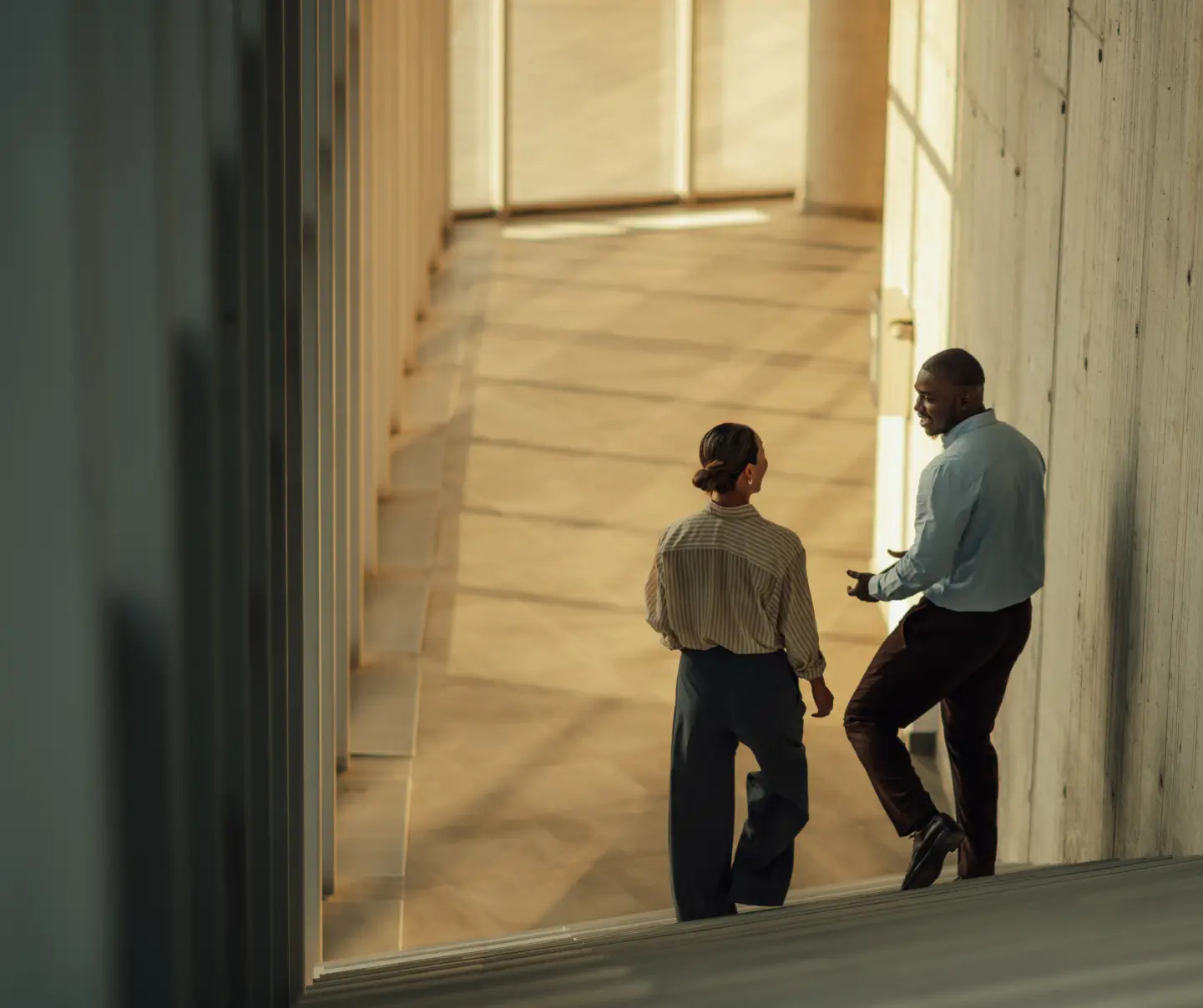 A consultant and a client discussing vendor alignment.