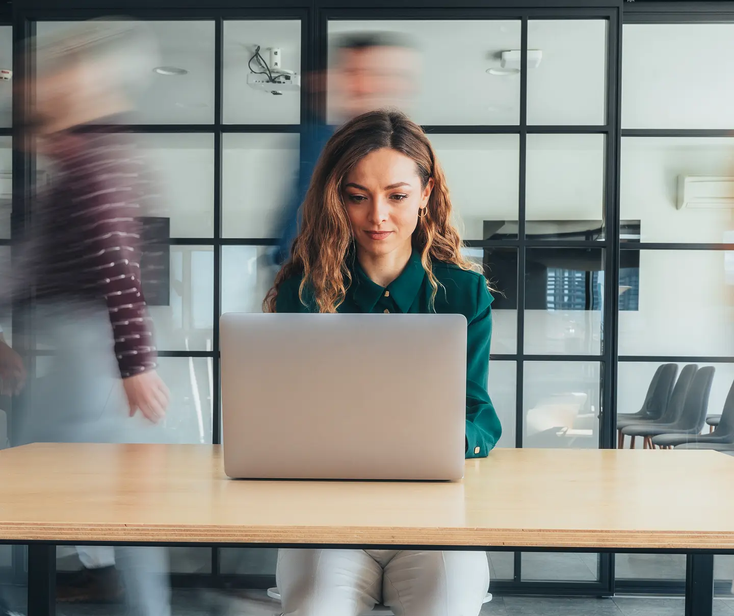 An account manager working on a client project and compliance details.