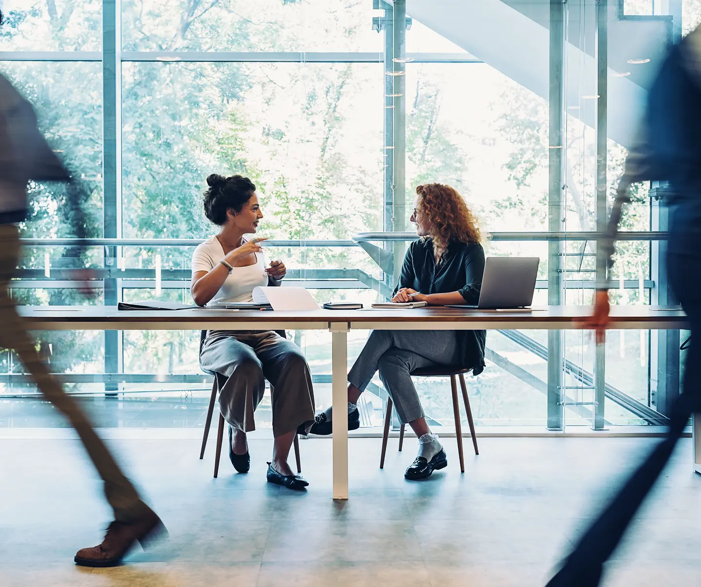 A collective insight consultant meeting with an executive.