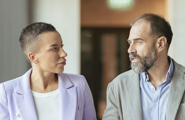 Two Powerside employees discussing power quality